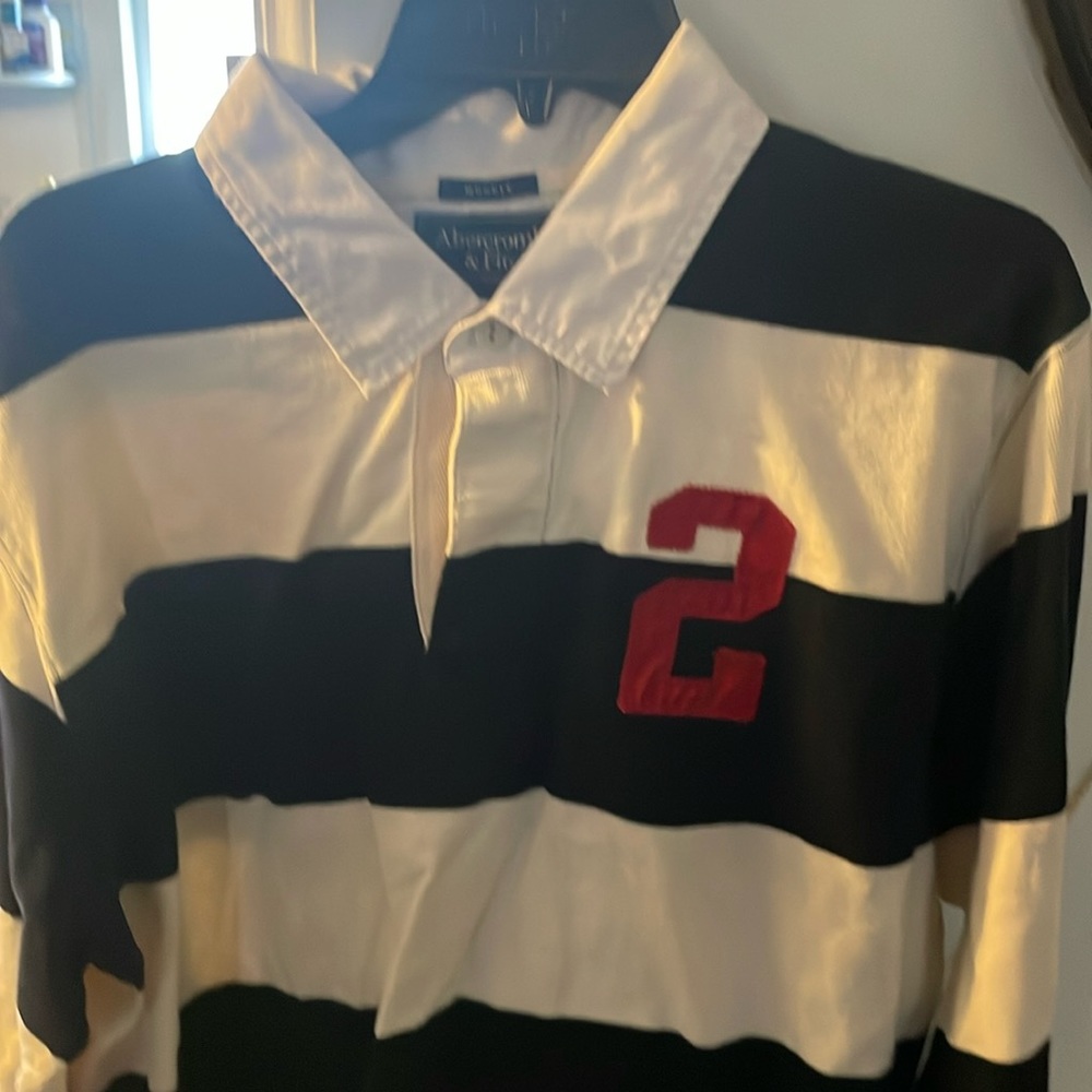 Albercrombie and Fitch , men’s XL ( runs smaller than regular XL )